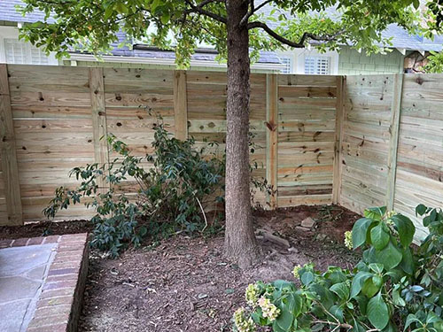 Restored and restained wood fence